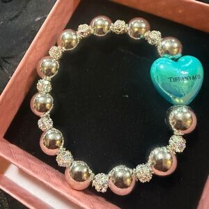 Tiffany & Co. Silver Bracelet with Blue Heart Charm